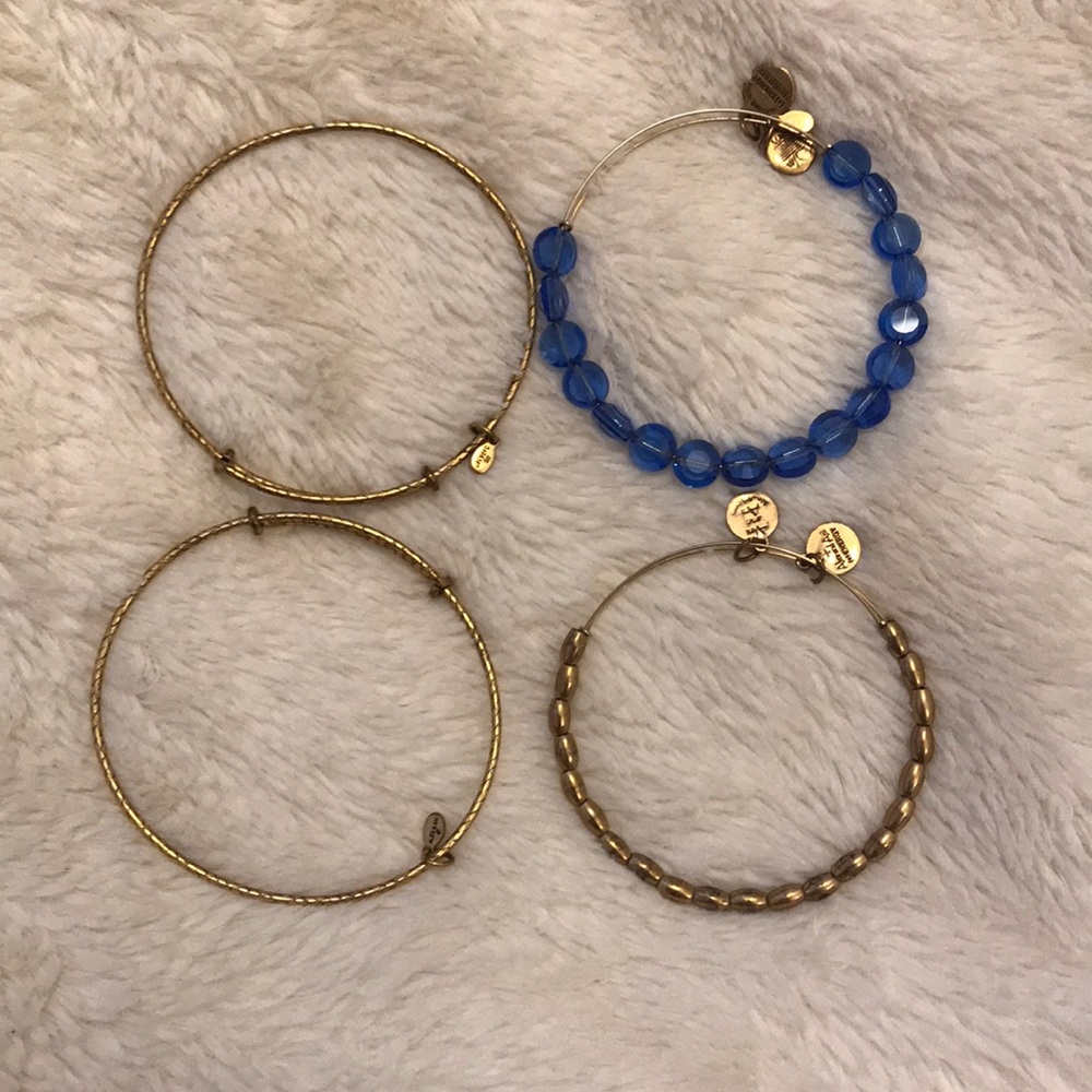 Alex and Ani set of 4 gold and blue bracelets
